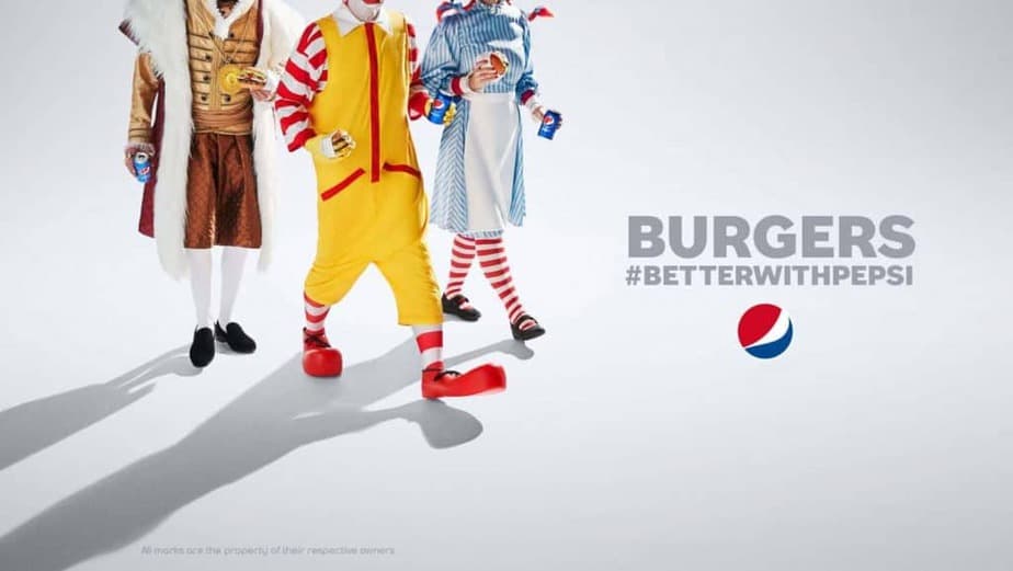 Images shows iconic fast food mascots to illustrate Pepsi's national hamburger day deal