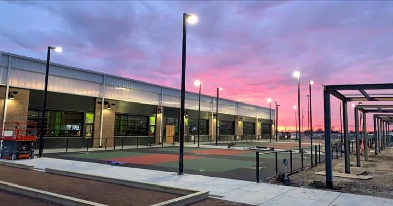 pickleball courts at night at Chicken N Pickle Wichita