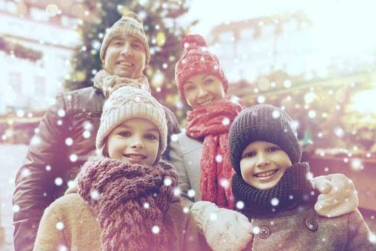 Christmas family outside in the snow