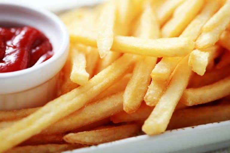 close-ups of french fries and ketchup