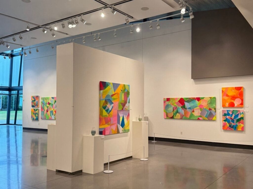 inside Mark Arts gallery colorful paintings