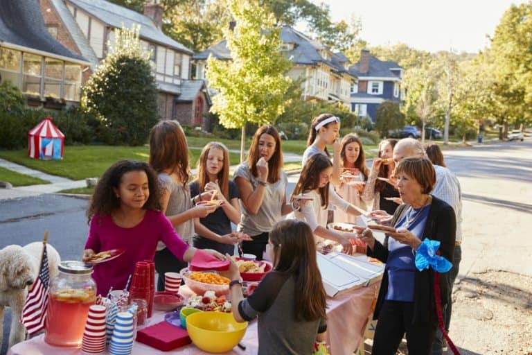 Neighbors having fun at a community block party