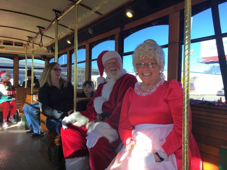 Santa rides the Q-line Trolley with Mrs. Claus, Wichita, KS