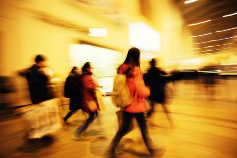 Black Friday shoppers hurrying to get to a sale