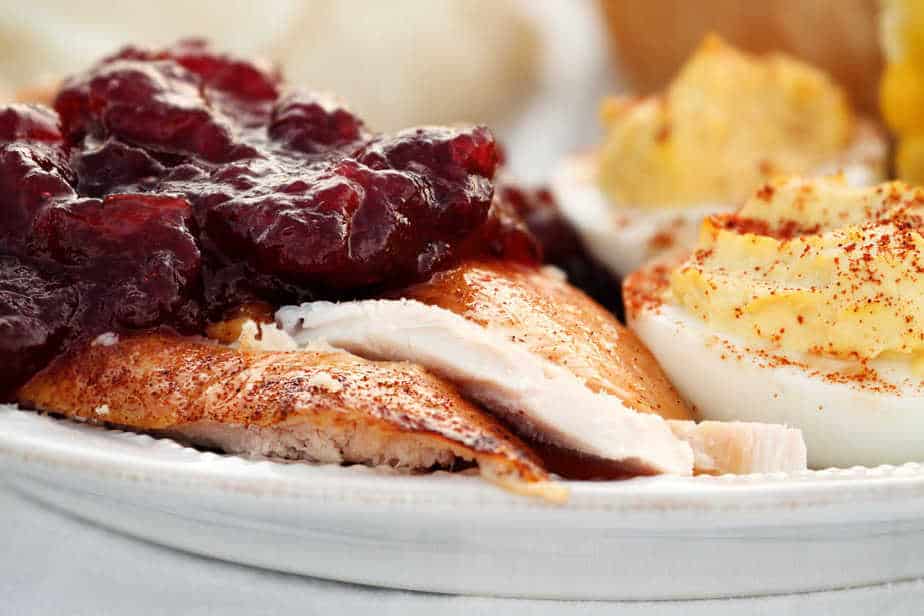 sliced turkey dinner with cranberry sauce